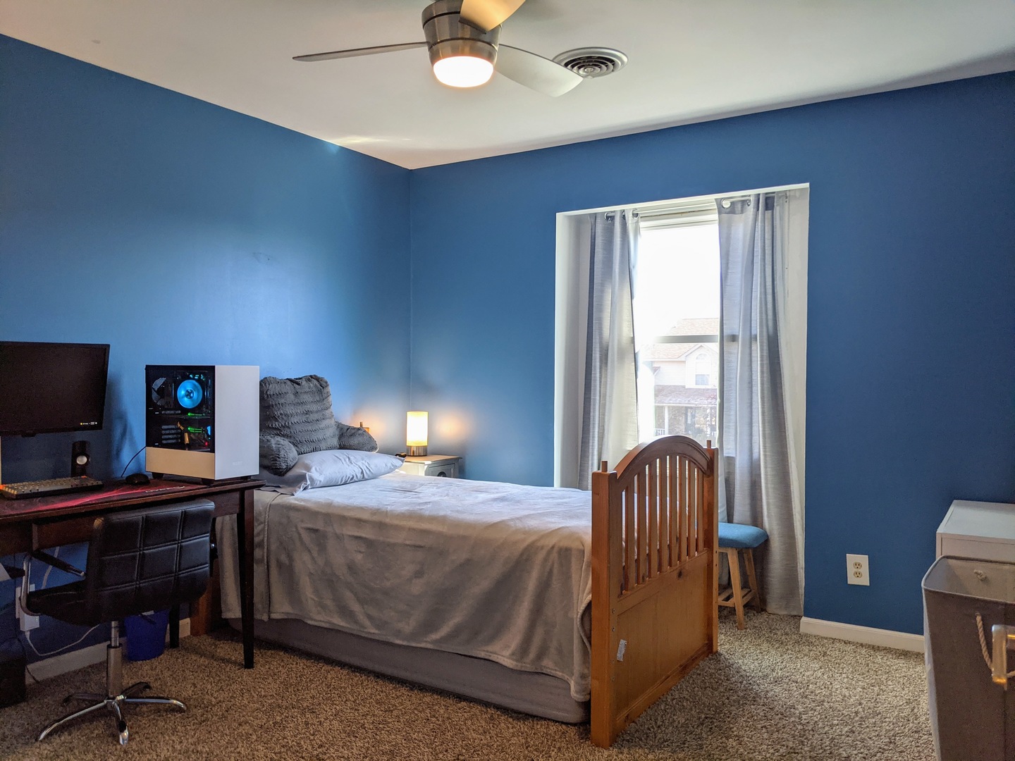 1409 Cobblefield Road Champaign, IL 61822 - Photo 54 of 73 a bedroom with a bed and a chandelier