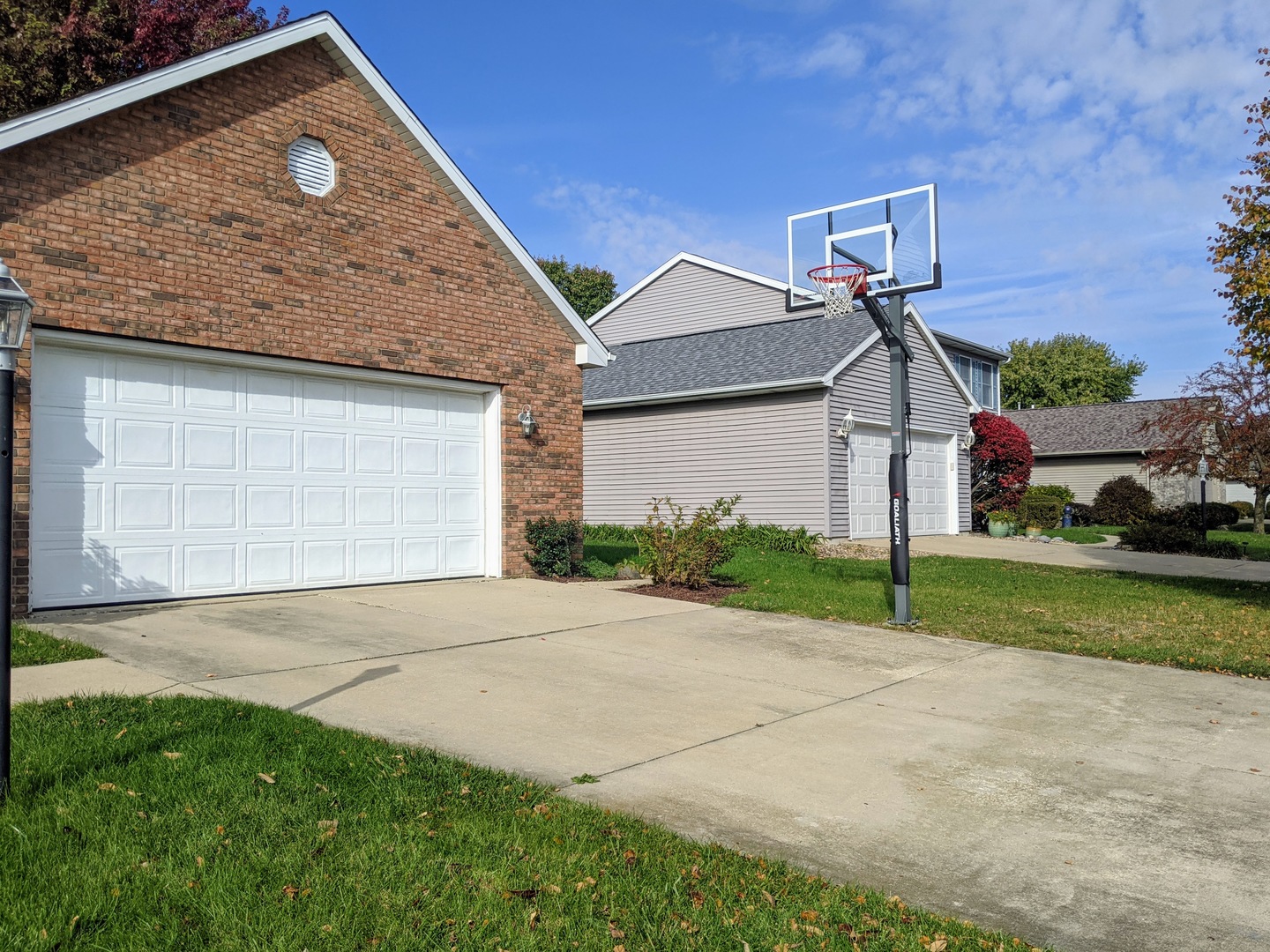 1409 Cobblefield Road Champaign, IL 61822 - Photo 66 of 73 a front view of a house with a yard and garage