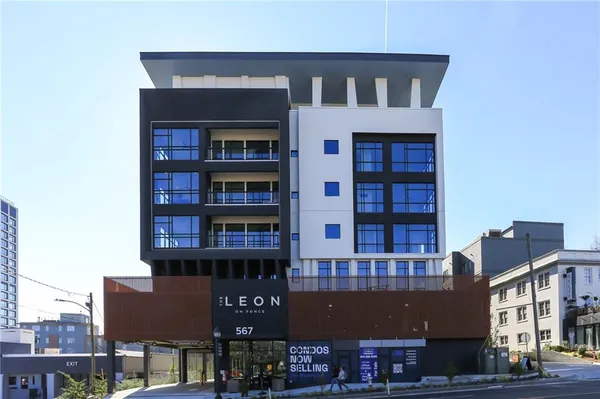a front view of a building with glass windows