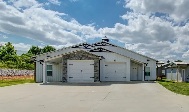 a view of a house with a garden