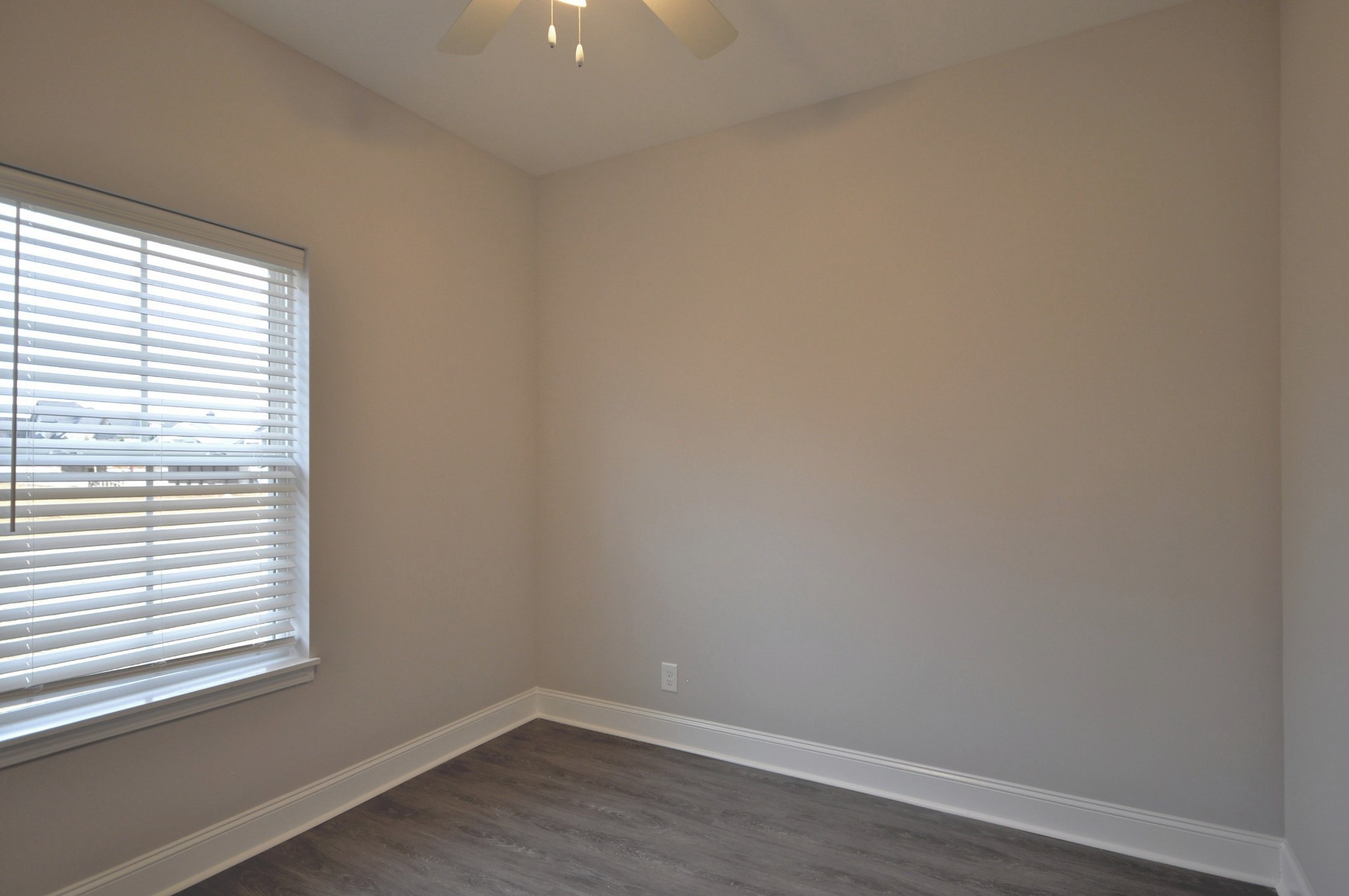 172 Bainbridge Drive, Unit B Clarksville, TN 37043 - Photo 20 of 35 a view of a small space with wooden floor and a window