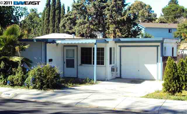 4388 Arthur Road Martinez, CA 94553 - Photo 1 of 1 a view of a house with a yard and plants
