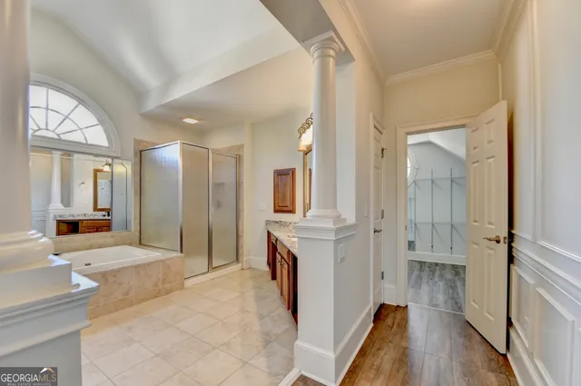 a view of entryway with wooden floor