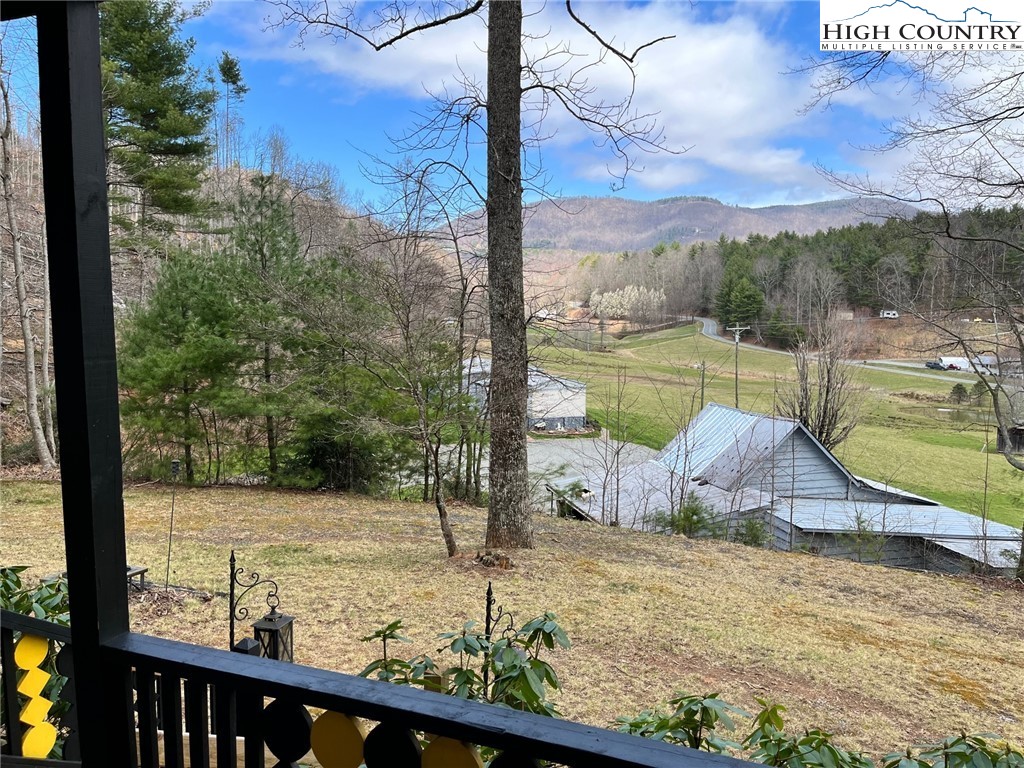 164 Smith Road Deep Gap, NC 28618 - Photo 1 of 16 a view of a swimming pool with a patio