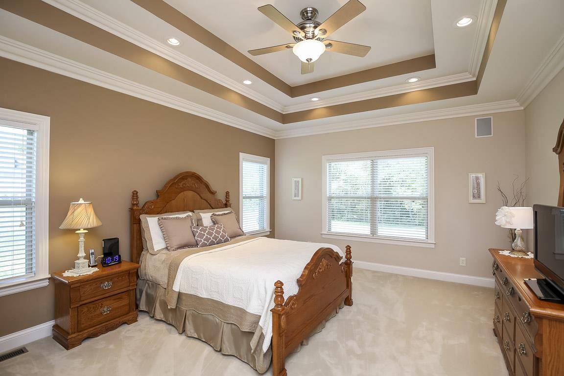 223 Butler Bridge Road Portland, TN 37148 - Photo 17 of 30 a bedroom with a bed and a window