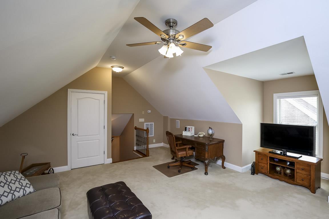 223 Butler Bridge Road Portland, TN 37148 - Photo 29 of 30 a living room with furniture and a flat screen tv