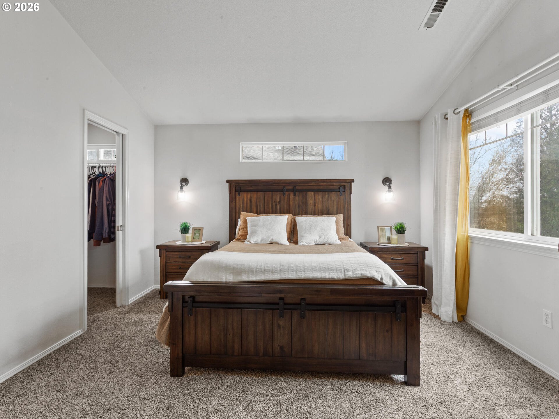 19200 Southeast 33rd Circle Camas, WA 98607 - Photo 17 of 43 a bedroom with a bed window and a table in it