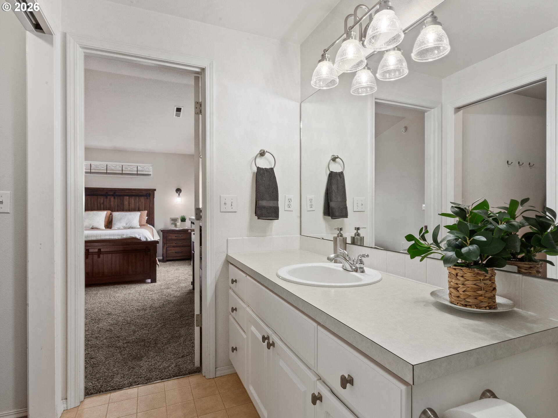 19200 Southeast 33rd Circle Camas, WA 98607 - Photo 22 of 43 a en suite bathroom with a sink double vanity and a mirror