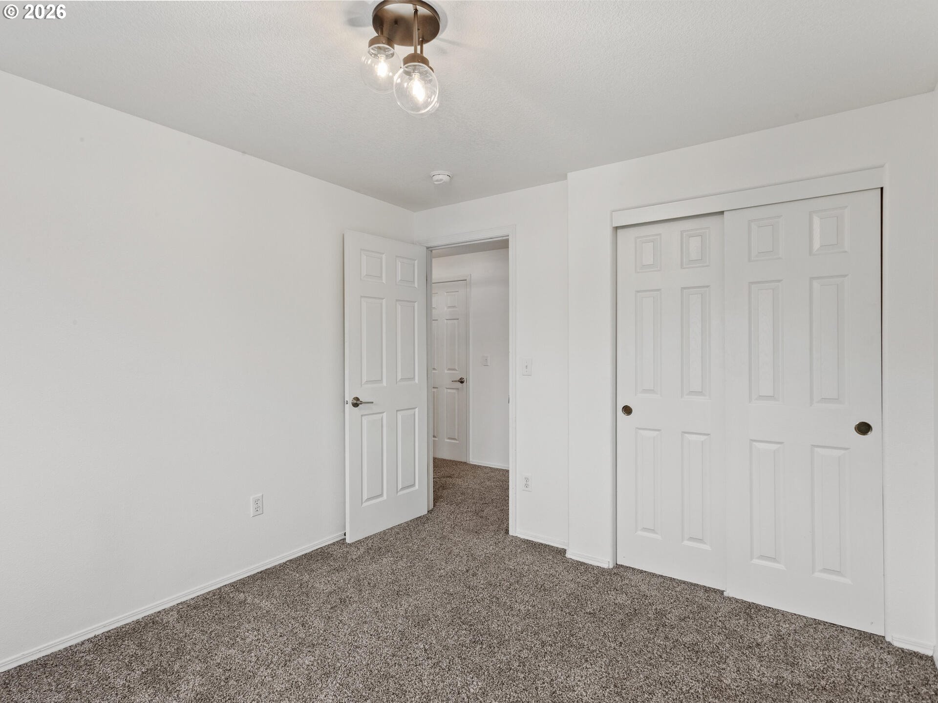19200 Southeast 33rd Circle Camas, WA 98607 - Photo 28 of 43 a view of an empty room and chandelier fan