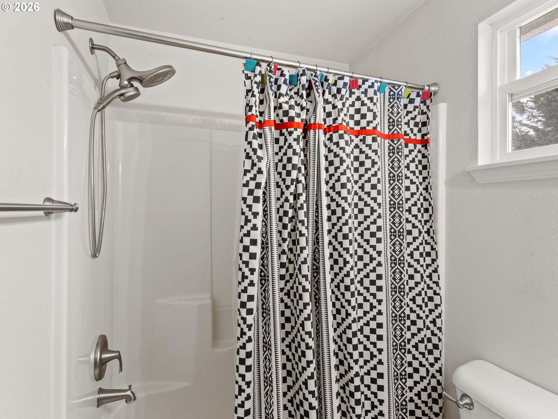 19200 Southeast 33rd Circle Camas, WA 98607 - Photo 30 of 43 a bathroom with a shower curtain and a sink