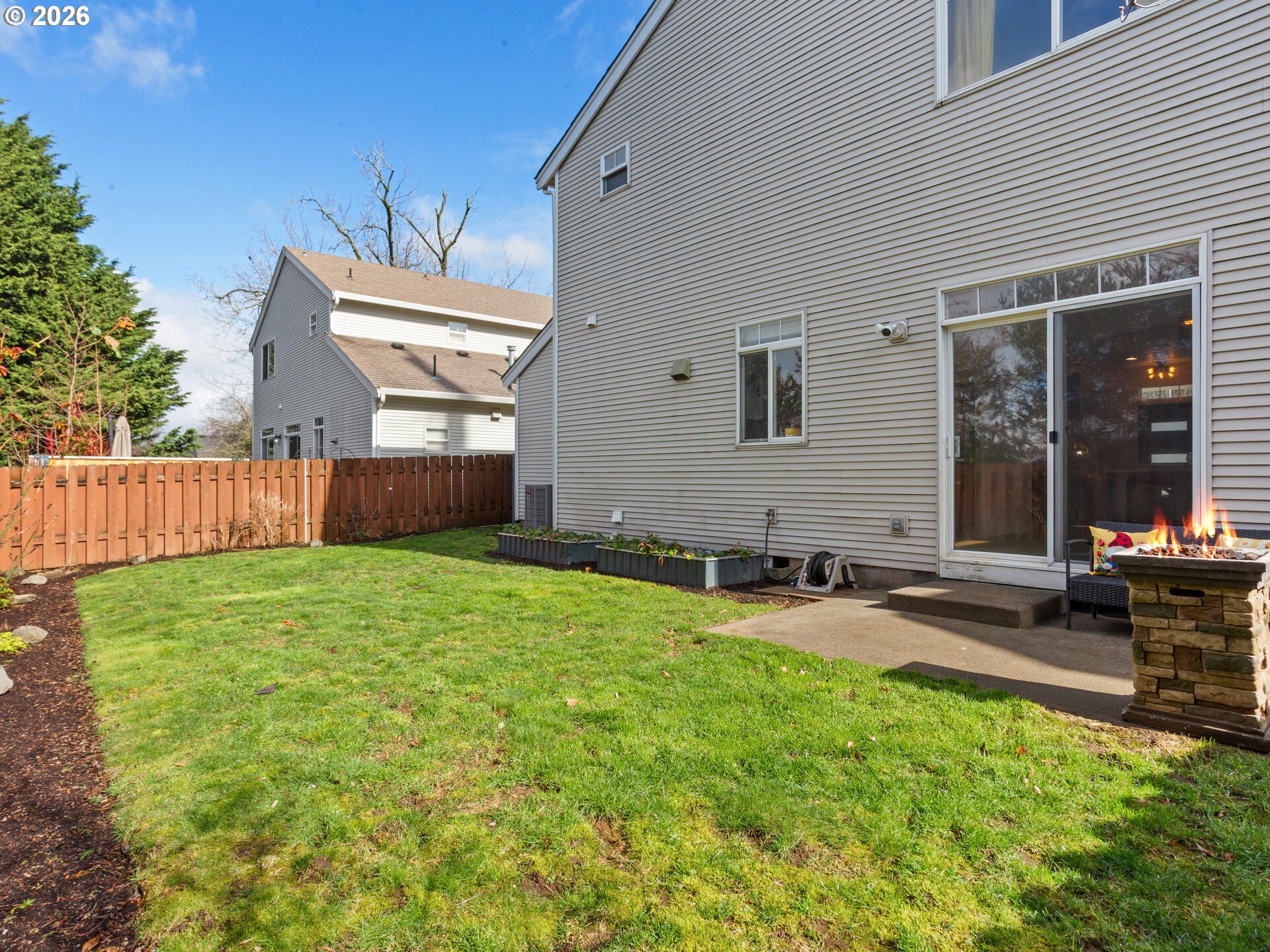 19200 Southeast 33rd Circle Camas, WA 98607 - Photo 32 of 43 a house view with a sitting space and garden