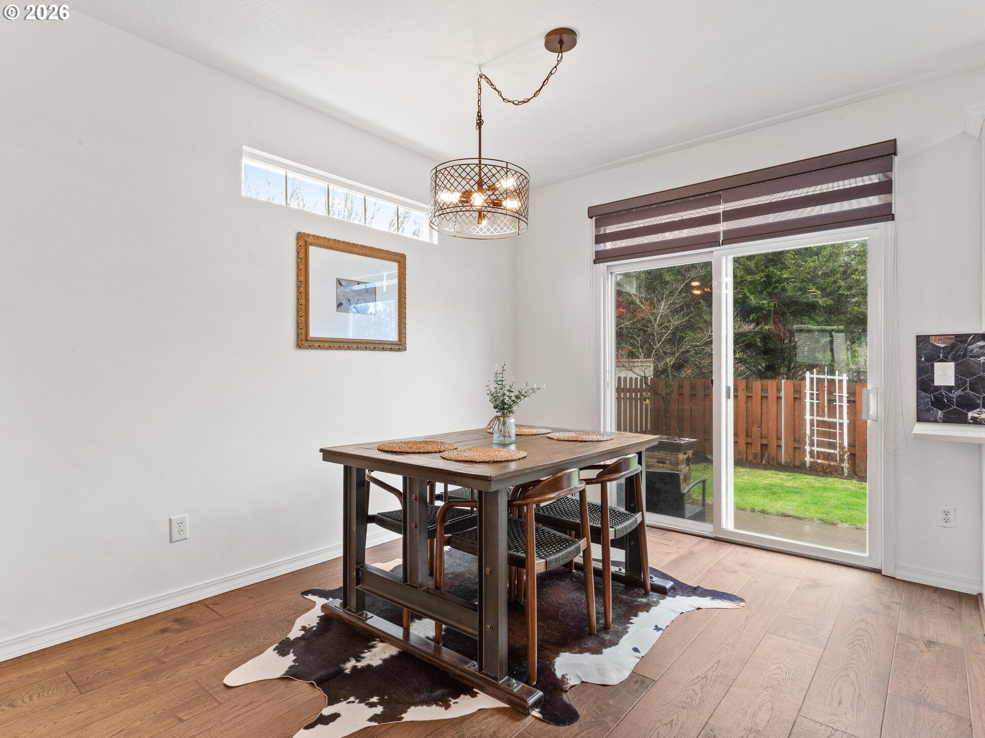 19200 Southeast 33rd Circle Camas, WA 98607 - Photo 7 of 43 a view of a dining room with furniture wooden floor and a chandelier