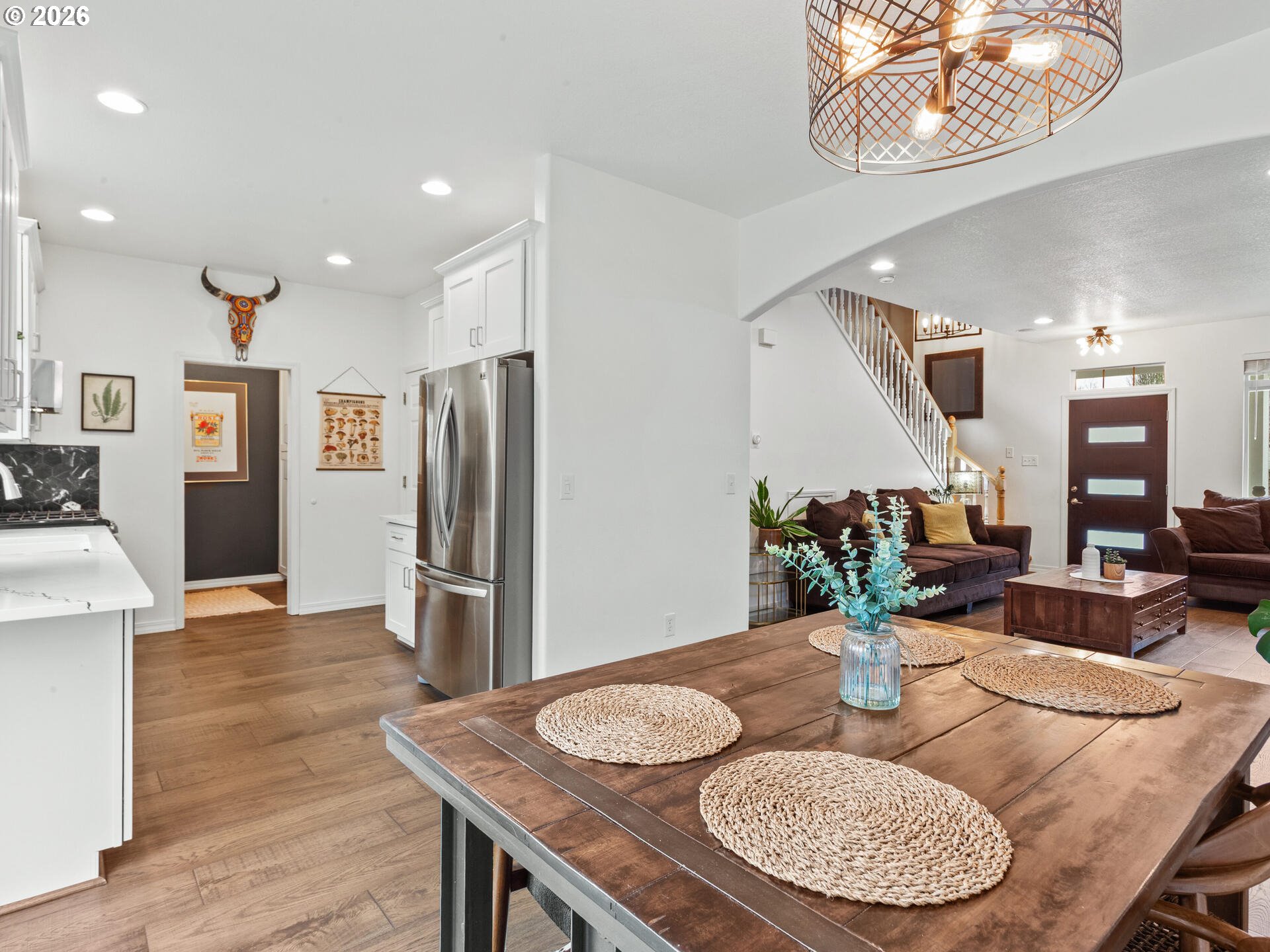 19200 Southeast 33rd Circle Camas, WA 98607 - Photo 9 of 43 a dining room with furniture and wooden floor