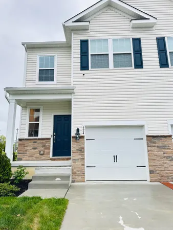 a front view of house with yard