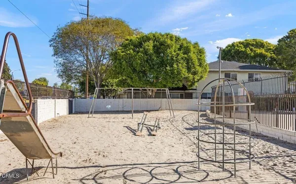 a view of a backyard with a patio