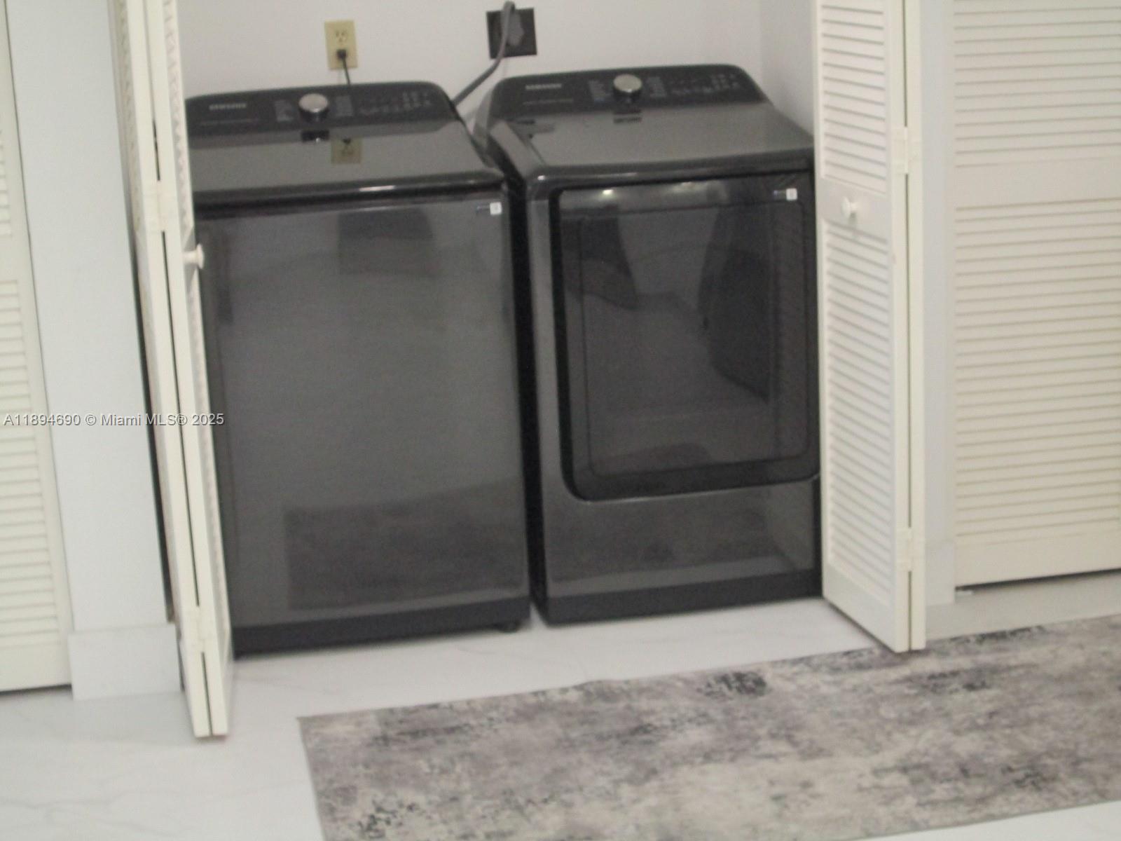 150 South Hollybrook Terrace, Unit 303 Pembroke Pines, FL 33025 - Photo 9 of 18 an empty room with wooden door