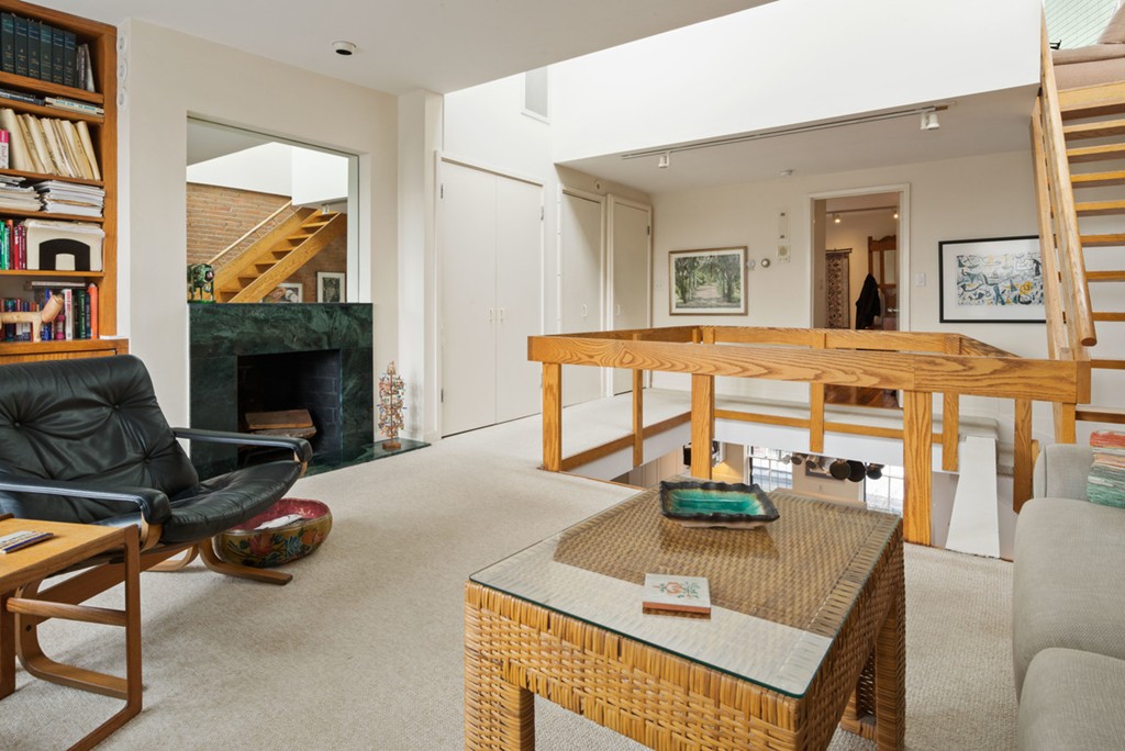 103 Appleton Street, Unit 4 Boston, MA 02116 - Photo 14 of 29 a living room with furniture a fireplace and a flat screen tv