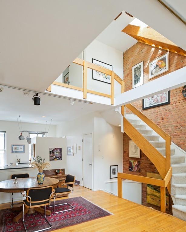 103 Appleton Street, Unit 4 Boston, MA 02116 - Photo 2 of 29 a workspace with furniture