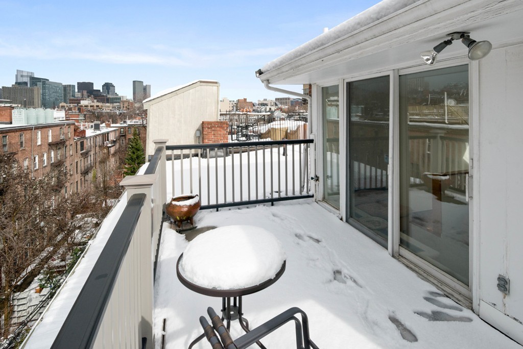 103 Appleton Street, Unit 4 Boston, MA 02116 - Photo 23 of 29 a view of a balcony with chair