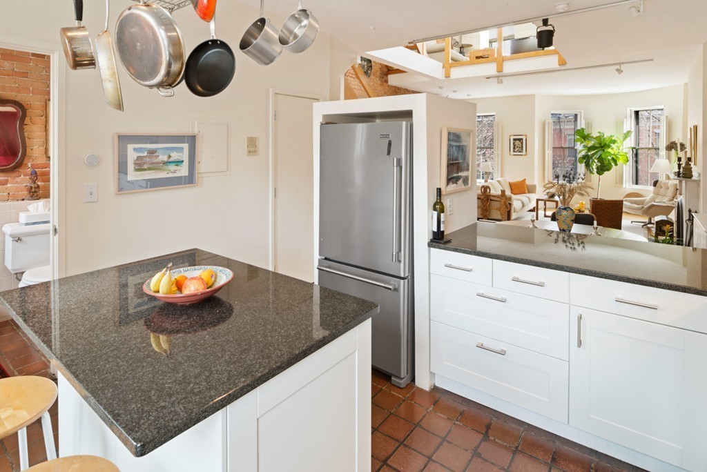 103 Appleton Street, Unit 4 Boston, MA 02116 - Photo 6 of 29 a kitchen with a sink a counter space and stainless steel appliances