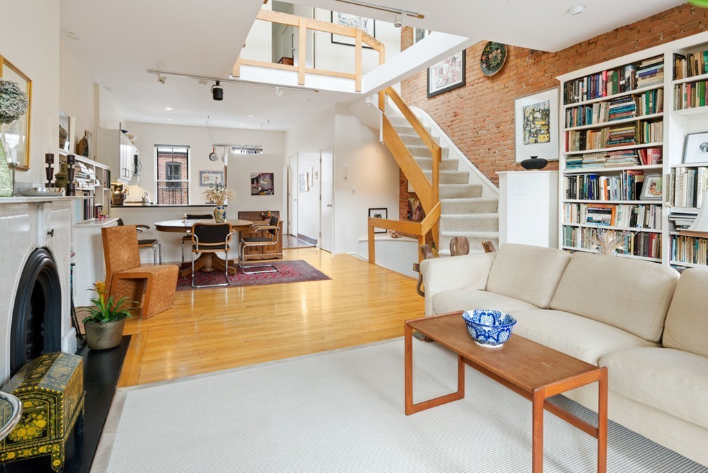 103 Appleton Street, Unit 4 Boston, MA 02116 - Photo 8 of 29 a living room with furniture kitchen view and a large window