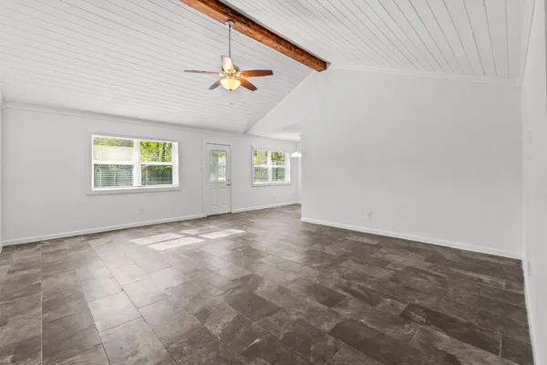 an empty room with windows