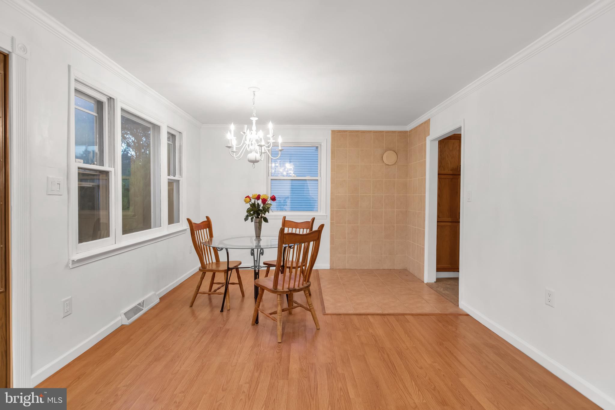 207 Brookfield Road Pasadena, MD 21122 - Photo 7 of 45 Dinning room- Pellet stove can be added back