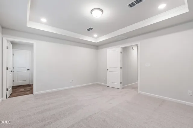 an empty room with entrance and door