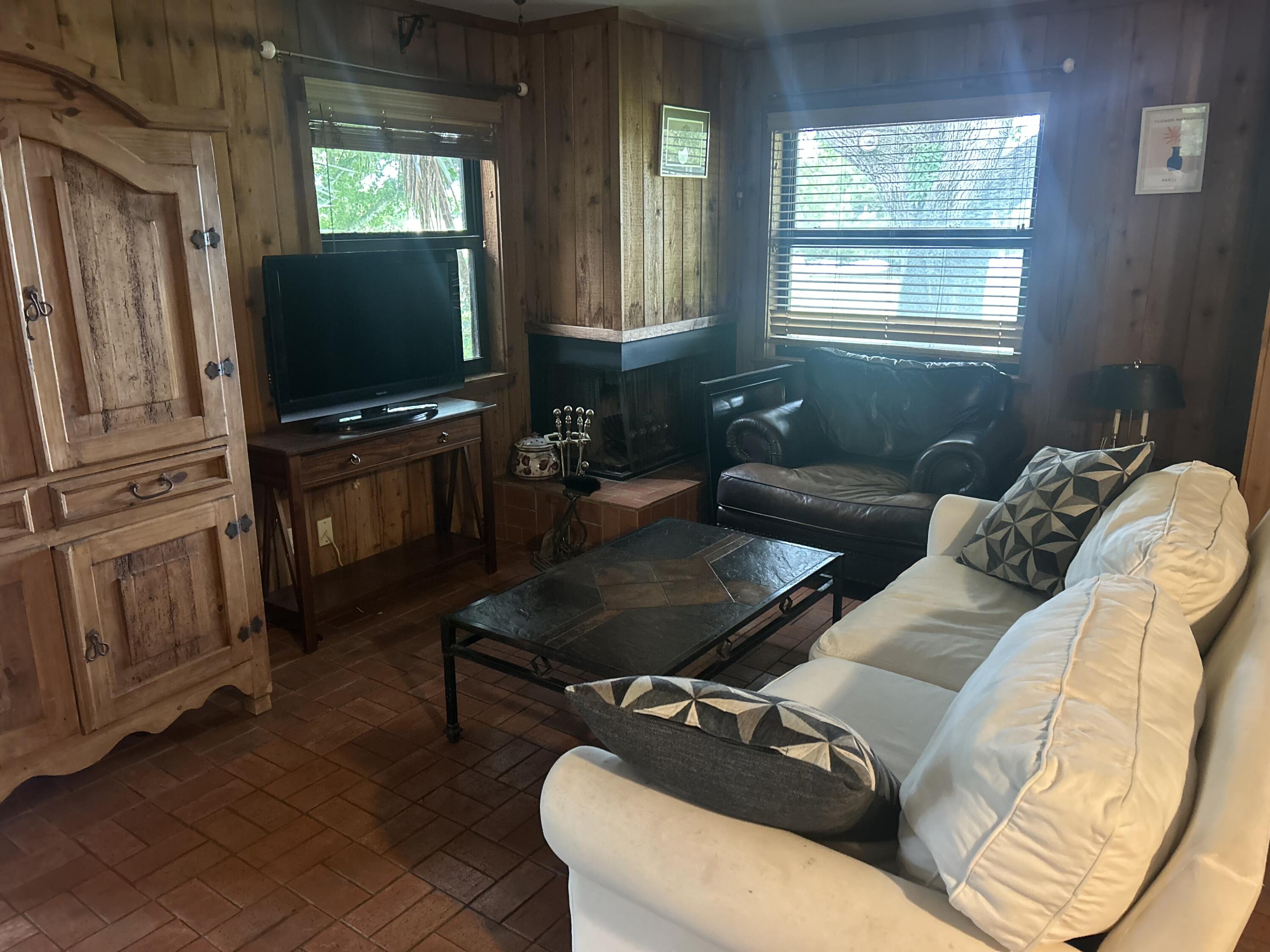 13821 53rd Road South Wellington, FL 33449 - Photo 6 of 10 a living room with furniture and a flat screen tv