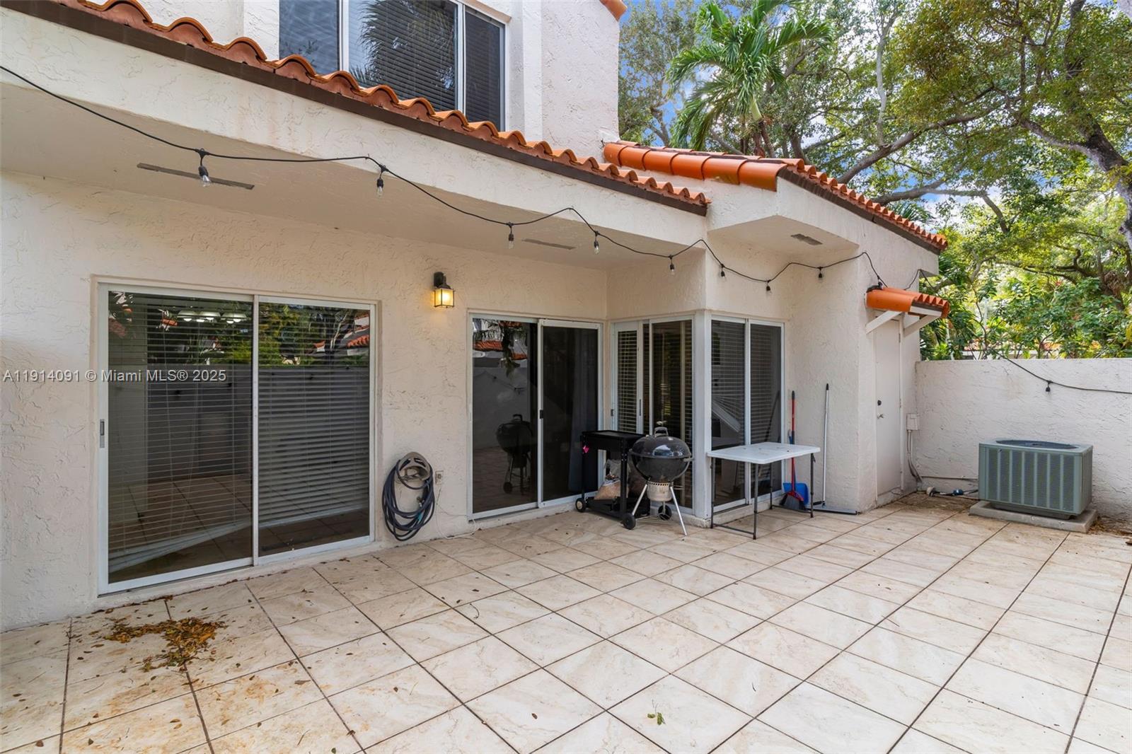 10930 Southwest 75th Street Miami, FL 33173 - Photo 27 of 34 a view of a chairs in front of house