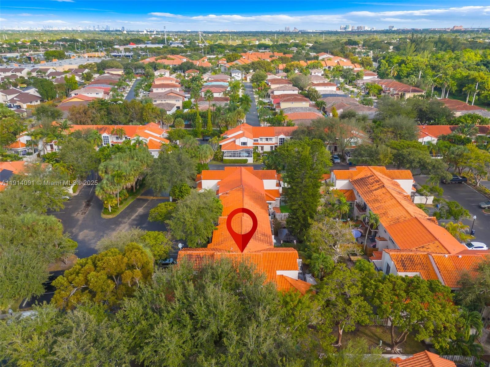 10930 Southwest 75th Street Miami, FL 33173 - Photo 31 of 34 an aerial view of residential houses with outdoor space and trees