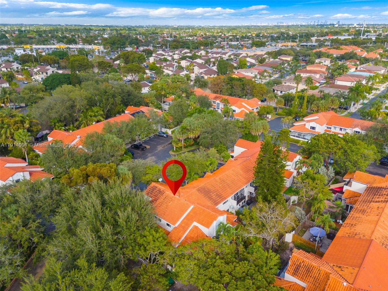 10930 Southwest 75th Street Miami, FL 33173 - Photo 32 of 34 an aerial view of residential houses with outdoor space and trees