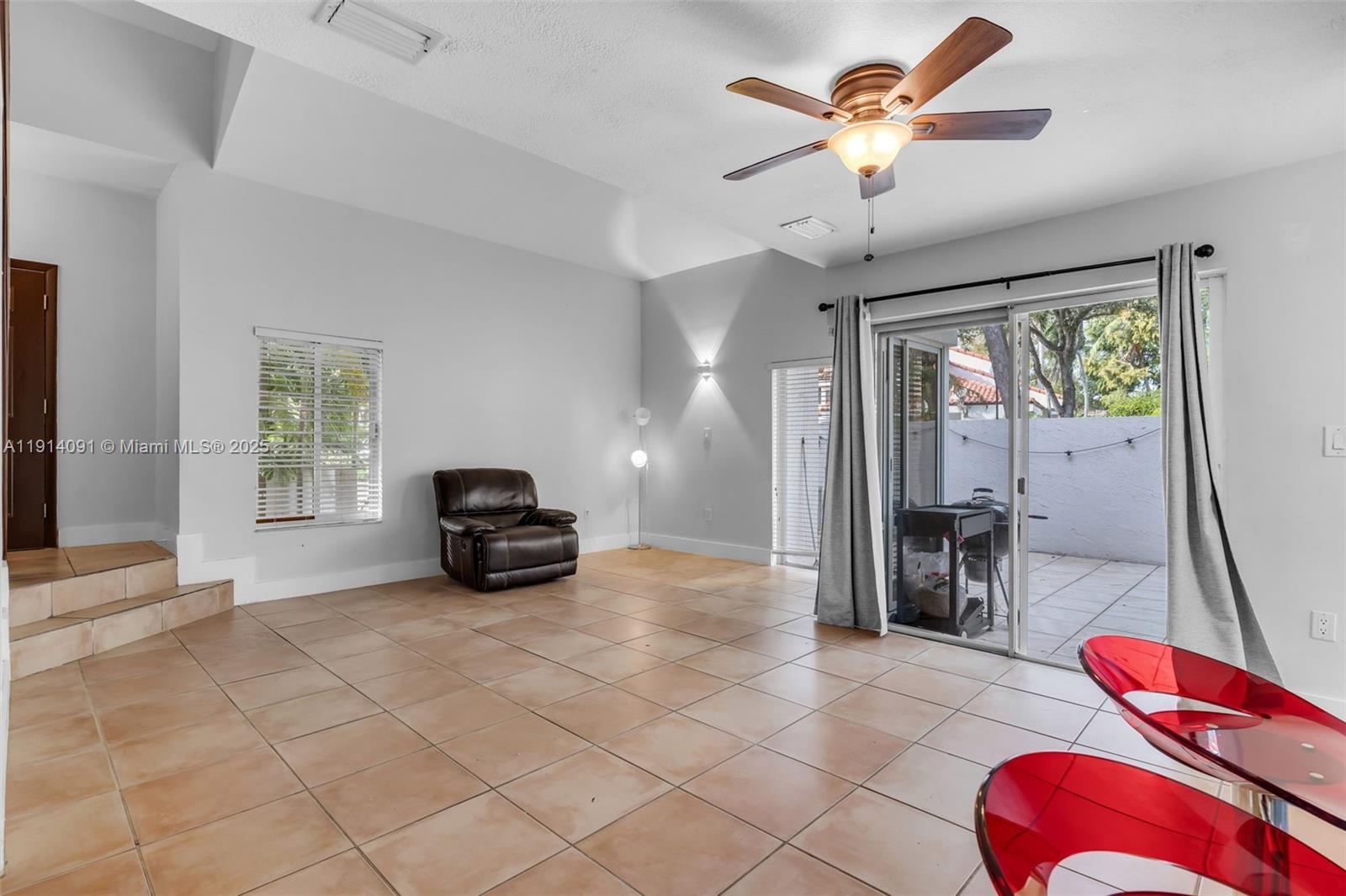 10930 Southwest 75th Street Miami, FL 33173 - Photo 9 of 34 a view of a livingroom with furniture