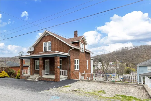 a view of a house with a patio