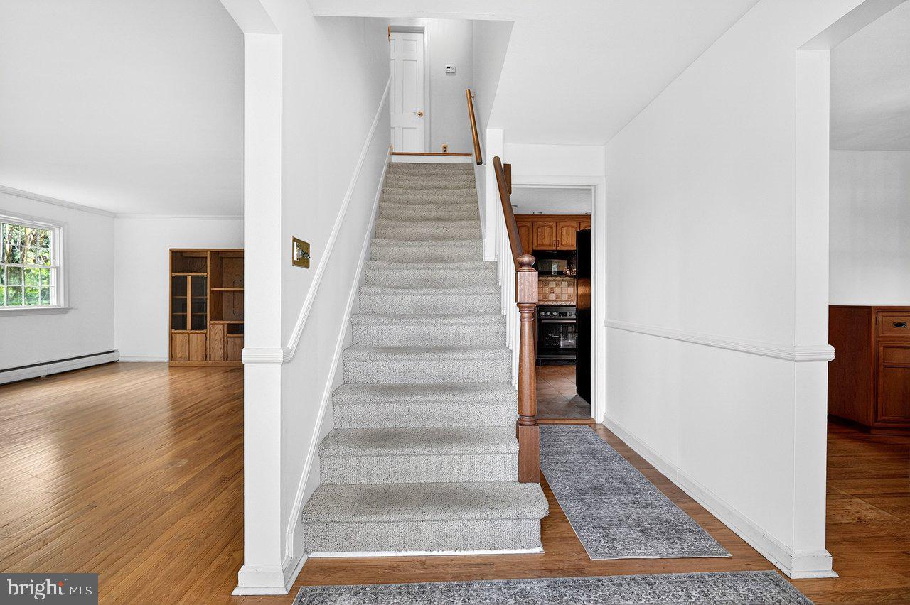 118 Bull Run Road Ewing, NJ 08638 - Photo 7 of 43 Inviting entryway with staircase charm.