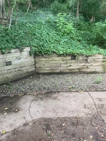 a backyard of a house with lots of green space