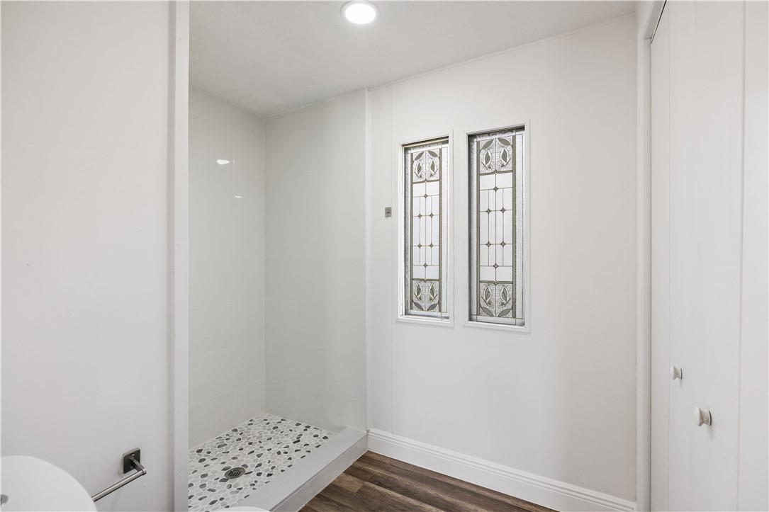 218 South Maple Street Fellsmere, FL 32948 - Photo 9 of 14 a view of hallway with stairs and wooden floor