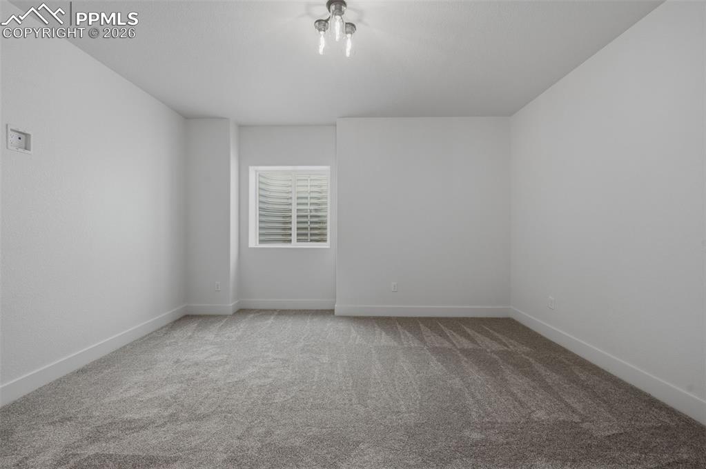 11293 Est Rdg Drive Peyton, CO 80831 - Photo 33 of 50 a view of an empty room with a window