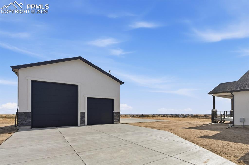 11293 Est Rdg Drive Peyton, CO 80831 - Photo 46 of 50 a view of an ocean and beach