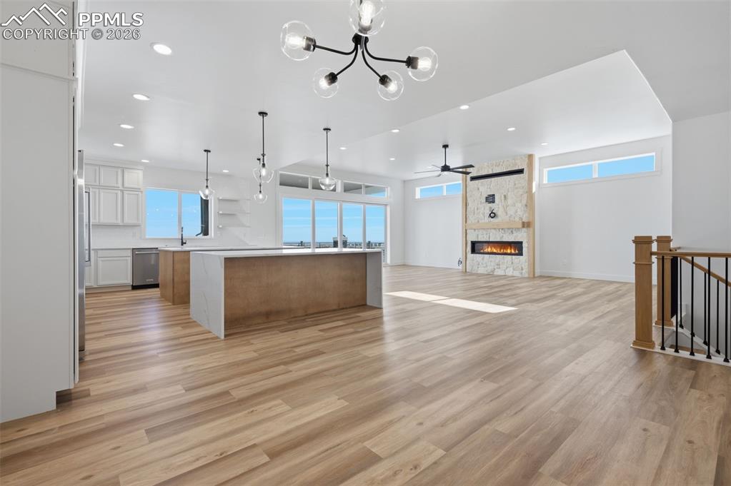11293 Est Rdg Drive Peyton, CO 80831 - Photo 10 of 50 a view of kitchen with cabinets and wooden floor