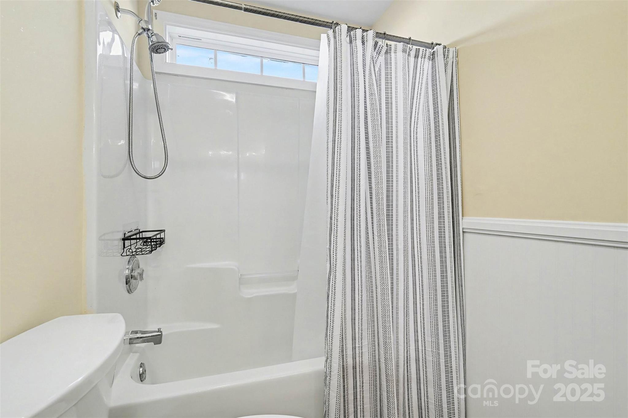 413 Dexter Place Monroe, NC 28110 - Photo 23 of 32 a bathroom with a glass shower door