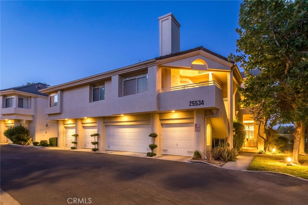 25534 Hemingway Avenue, Unit B Stevenson Ranch, CA 91381 - Photo 1 of 1 a view of a building with a street