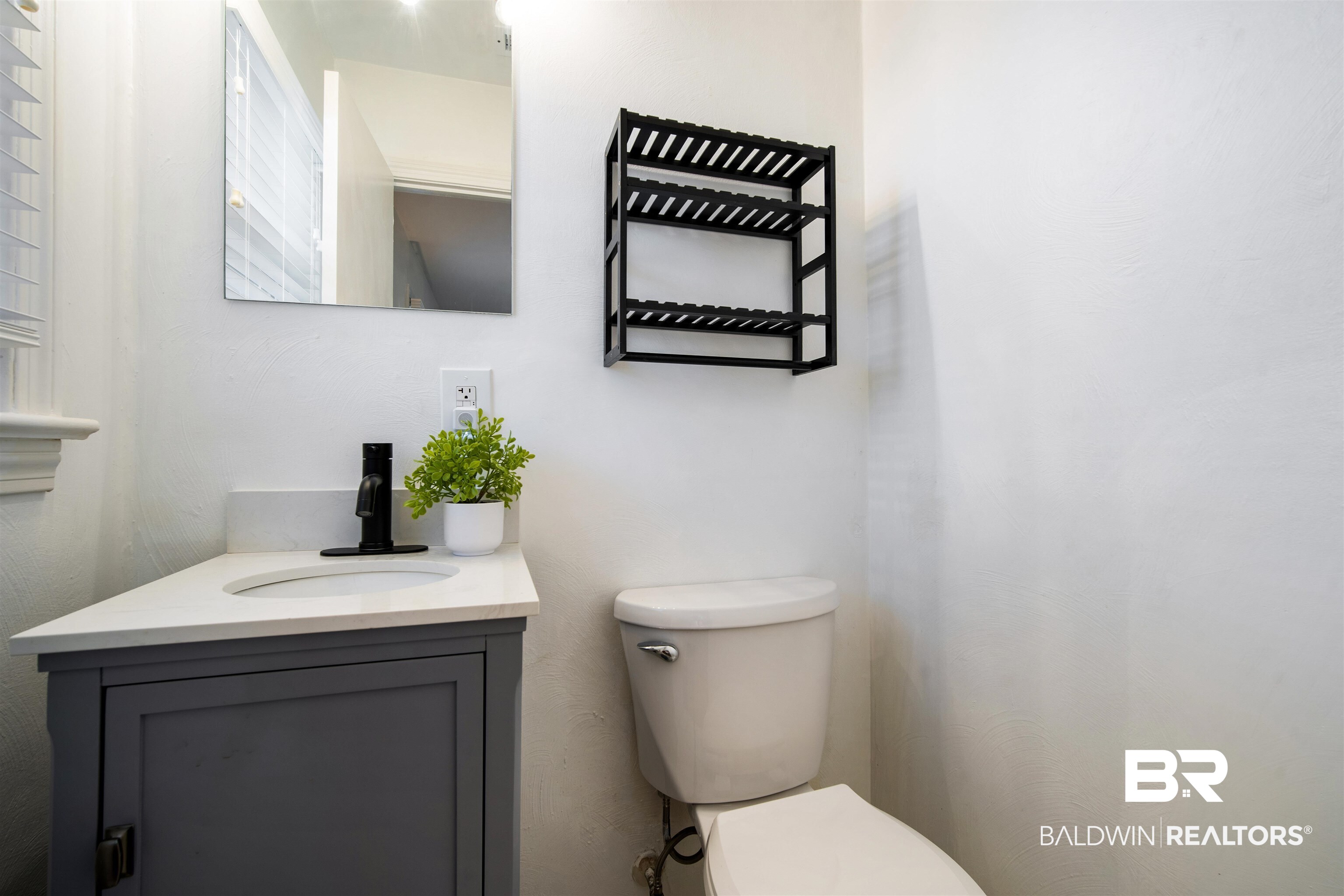 2615 Walton Avenue Mobile, AL 36606 - Photo 11 of 33 Half bath featuring vanity and toilet