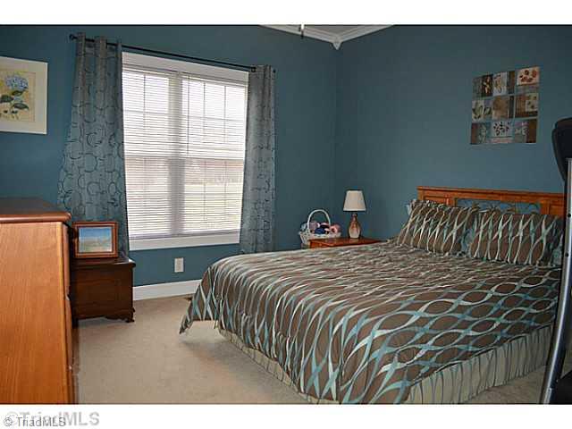 7083 Lanier Road Summerfield, NC 27358 - Photo 11 of 25 2nd Bedroom. Great space with attached bath.