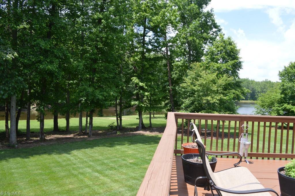 7083 Lanier Road Summerfield, NC 27358 - Photo 19 of 25 Exterior Back. Amazing views in every direction from your backyard deck!
