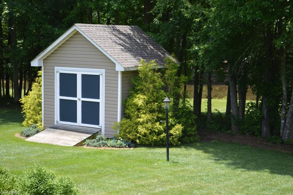 7083 Lanier Road Summerfield, NC 27358 - Photo 21 of 25 Fantastic storage/utility shed!