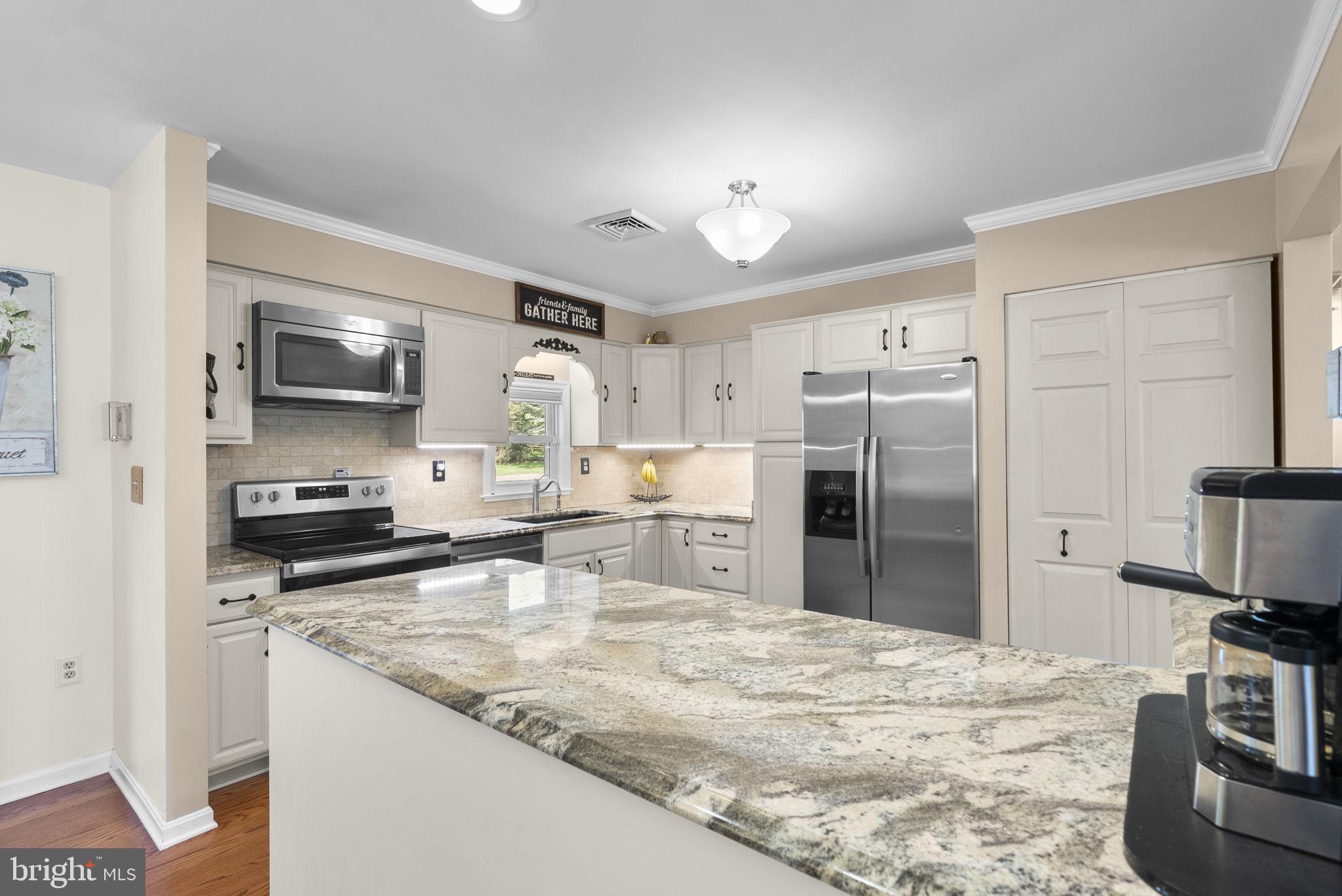 5140 Perry Road Mount Airy, MD 21771 - Photo 12 of 55 Modern kitchen with elegant finishes.