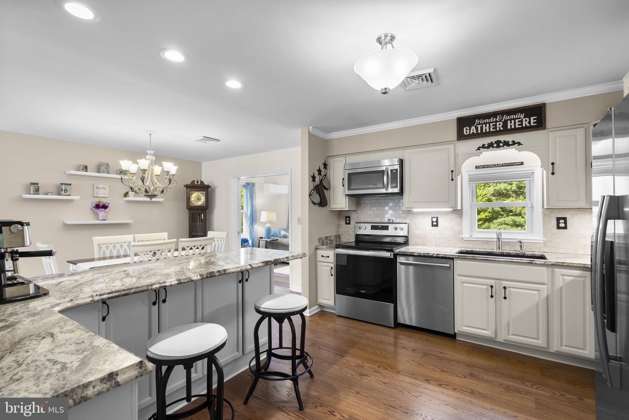 5140 Perry Road Mount Airy, MD 21771 - Photo 13 of 55 Modern kitchen with inviting charm.