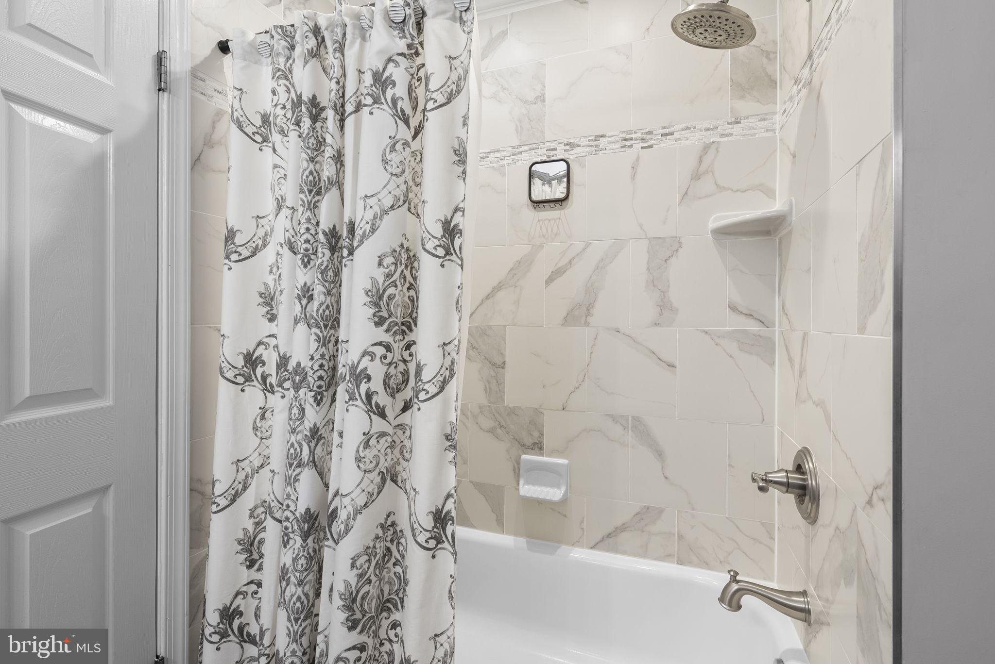 5140 Perry Road Mount Airy, MD 21771 - Photo 22 of 55 Elegant bathroom with marble accents.