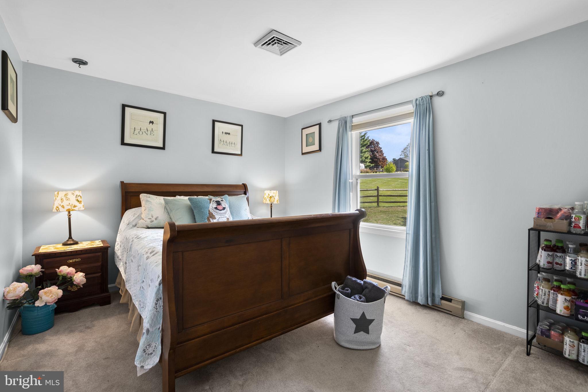 5140 Perry Road Mount Airy, MD 21771 - Photo 23 of 55 Serene bedroom with natural light.